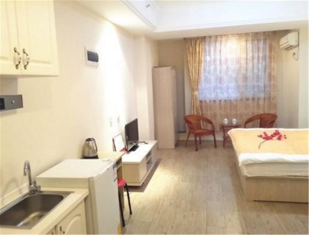 Qingdao Lubang Fengqing Apartment Chengyang Værelse billede